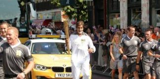 Amitabh Bachchan carries Olympic Torch in London